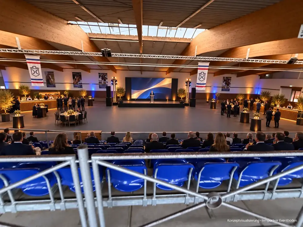 Konzeptvisualisierung: Bühne mit Rednerpult und LED-Wand in der Fritz-Thiedemann-Halle, Gäste auf der Tribüne